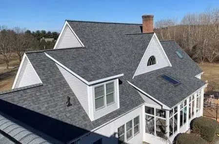 Aerial view of a Connecticut neighborhood with finished roofs